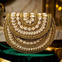 Bahari Luxe Cowry Shell Clutch