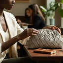 THE PHILLIS WOVEN CLUTCH