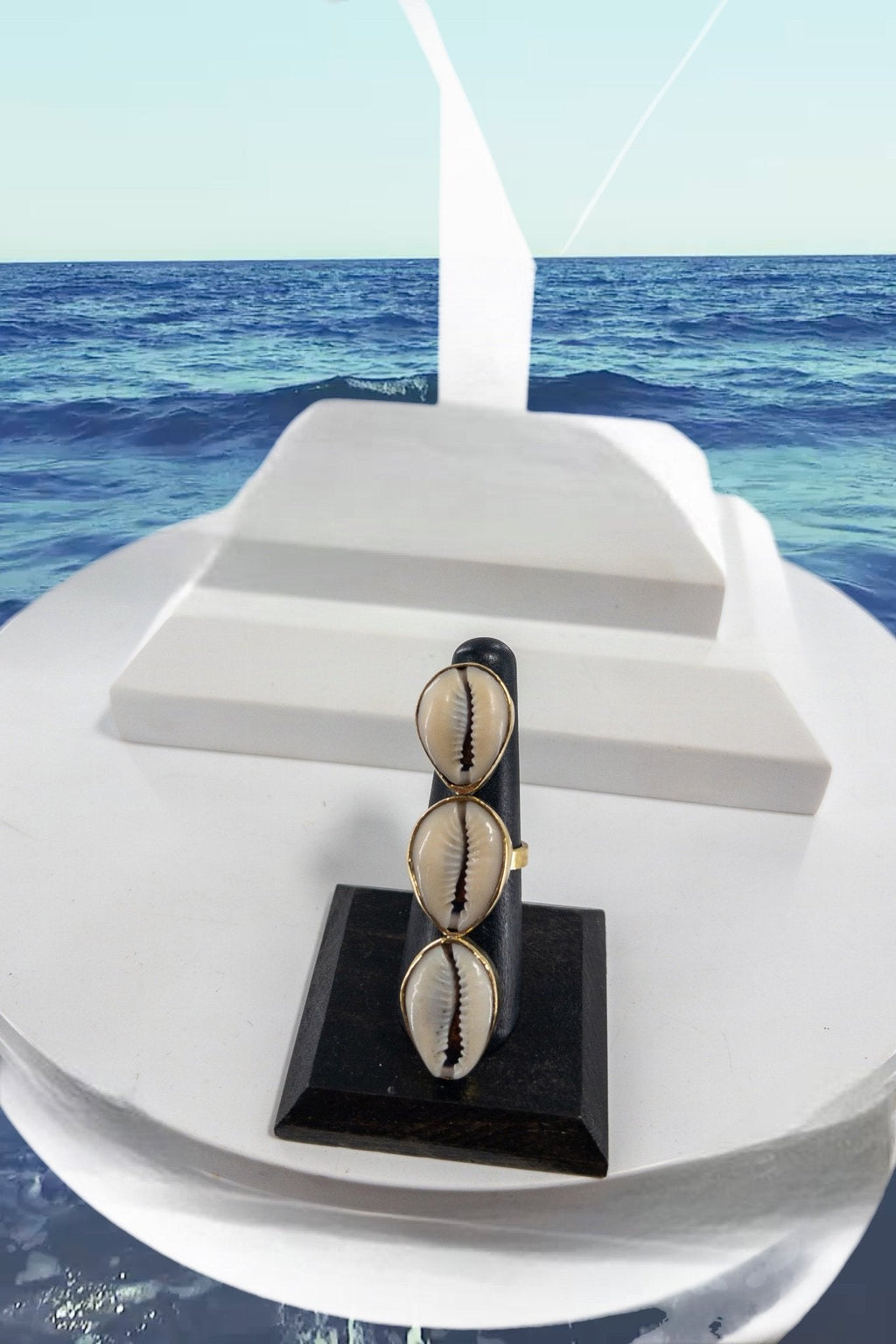 Kaure cowry Shell and brass statement ring