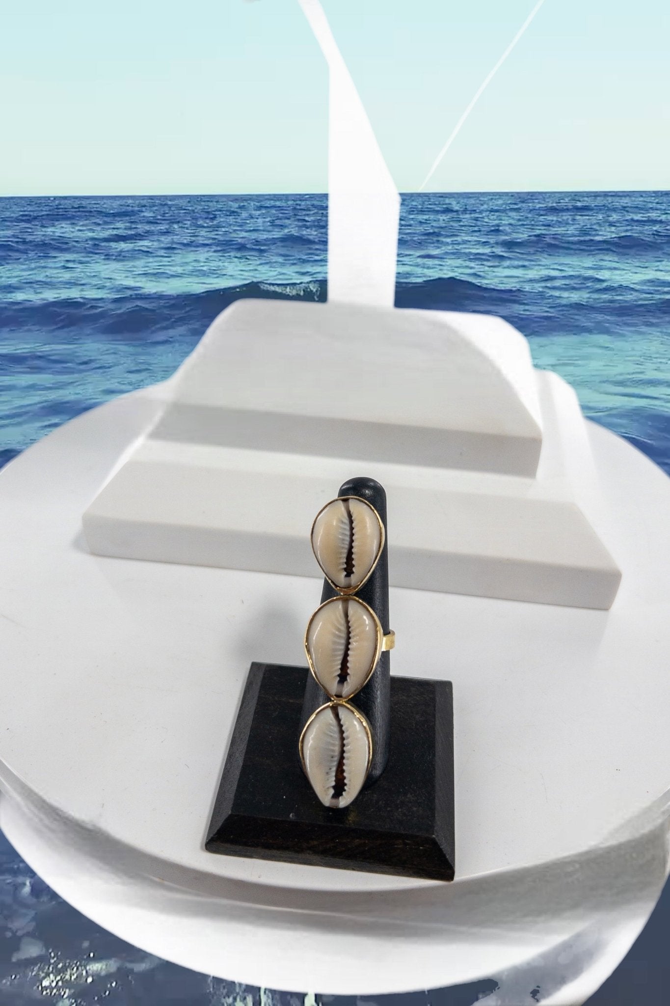 Kaure cowry Shell and brass statement ring